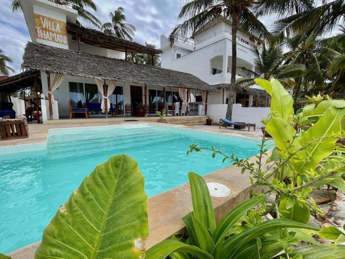 Villa Thamani fronte mare direttamente sulla spiaggia con piscina privata! Pwani Mchangani Esterno foto