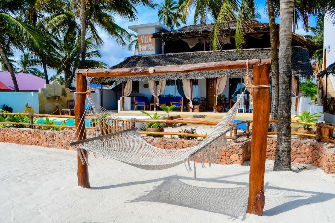 Villa Thamani fronte mare direttamente sulla spiaggia con piscina privata! Pwani Mchangani Esterno foto