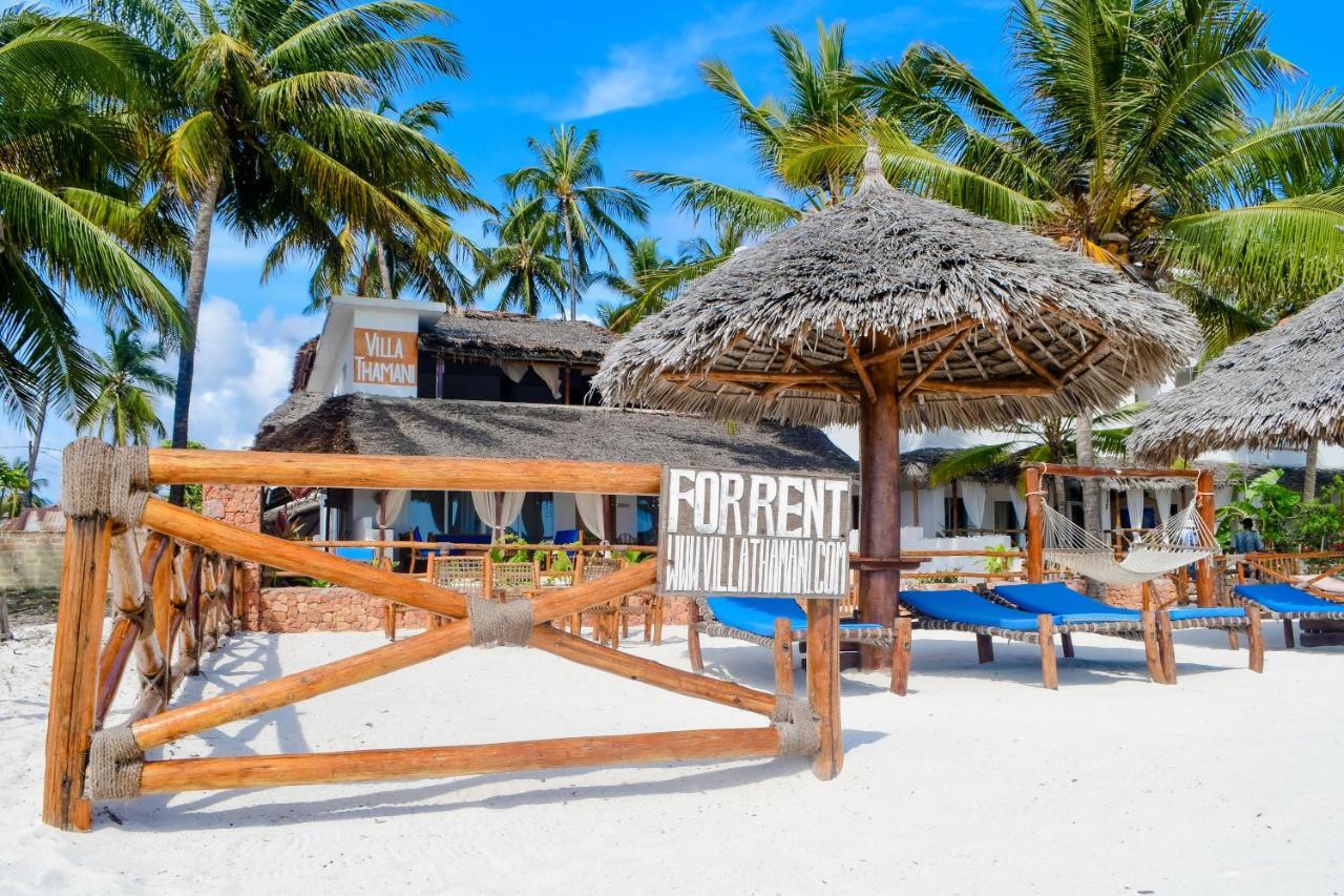 Villa Thamani fronte mare direttamente sulla spiaggia con piscina privata! Pwani Mchangani Esterno foto